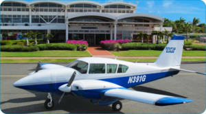 Our blue and white Piper Aztec on the ramp at Beef Island Airport, part of our fleet at Island Birds.