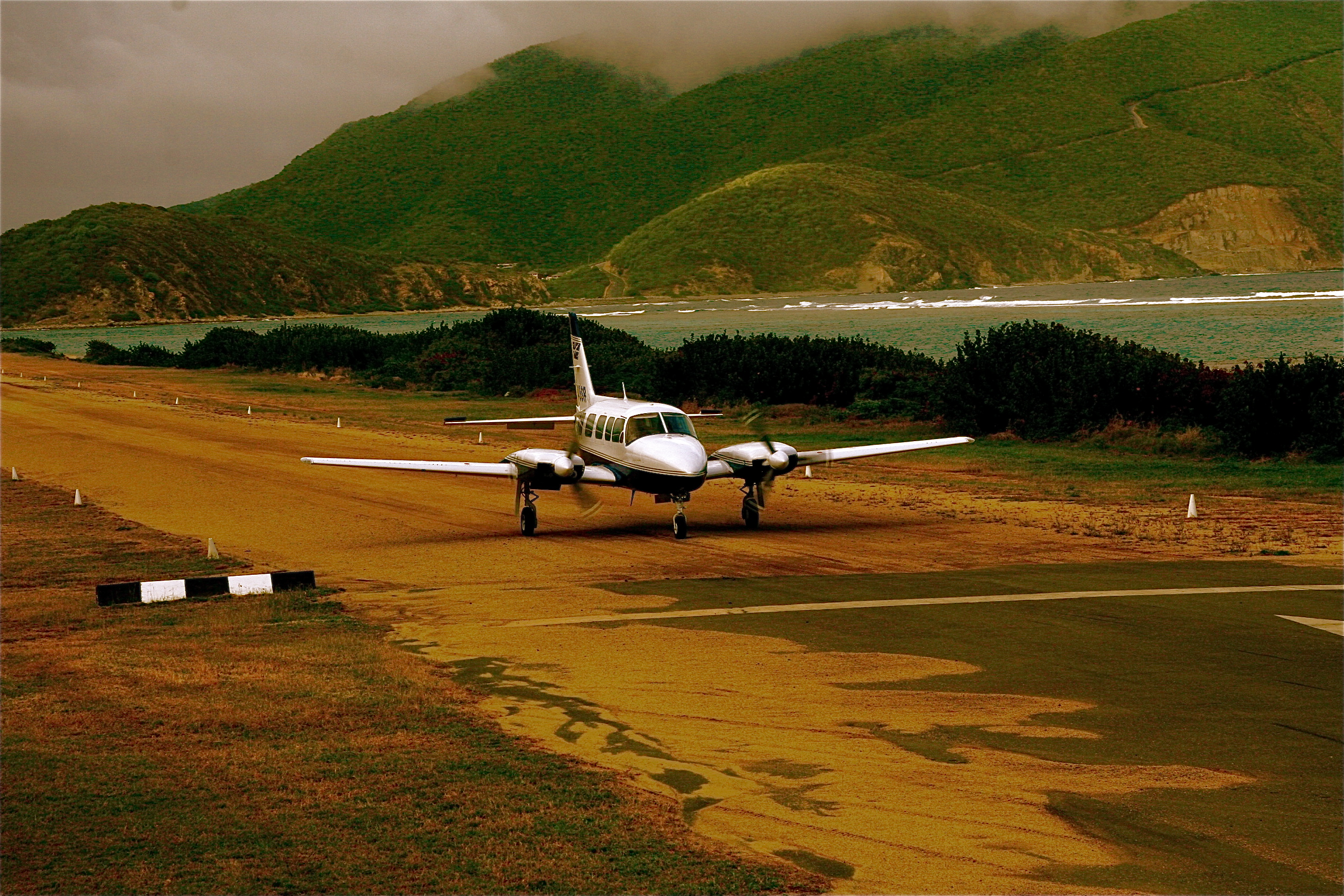 Island Birds Chieftain landing in Virgin Gorda on a cloudy day