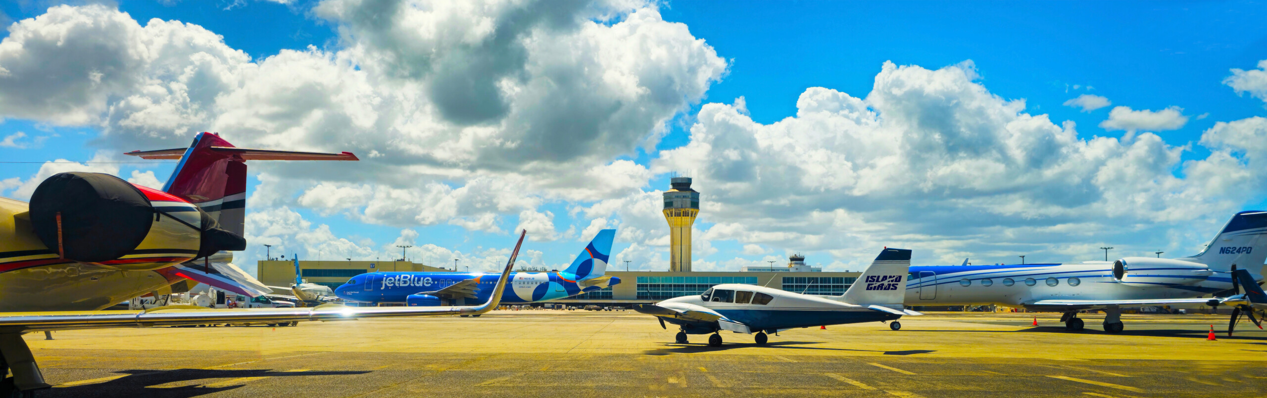Island Birds aircraft parked at AAS FBO in San Juan for a seamless commercial connection