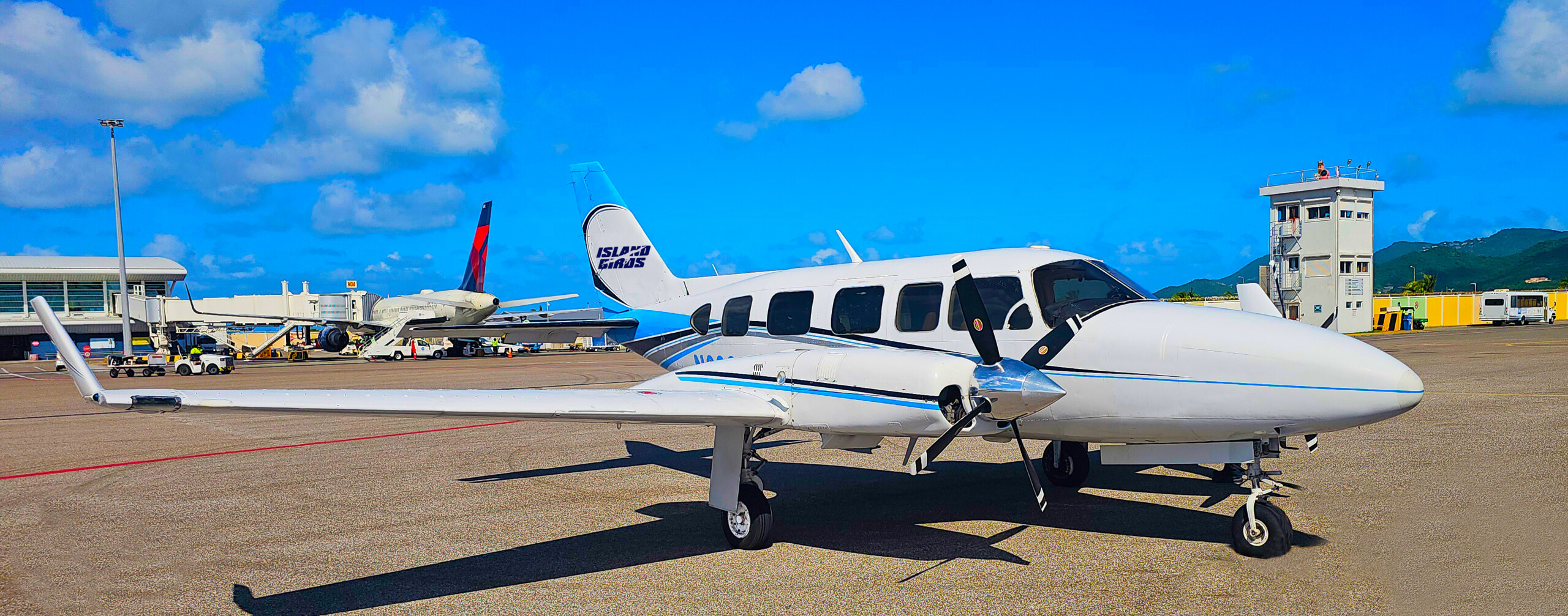 Island Birds Chieftain parked at Execujet FBO in St. Maarten ready for passenger pickup
