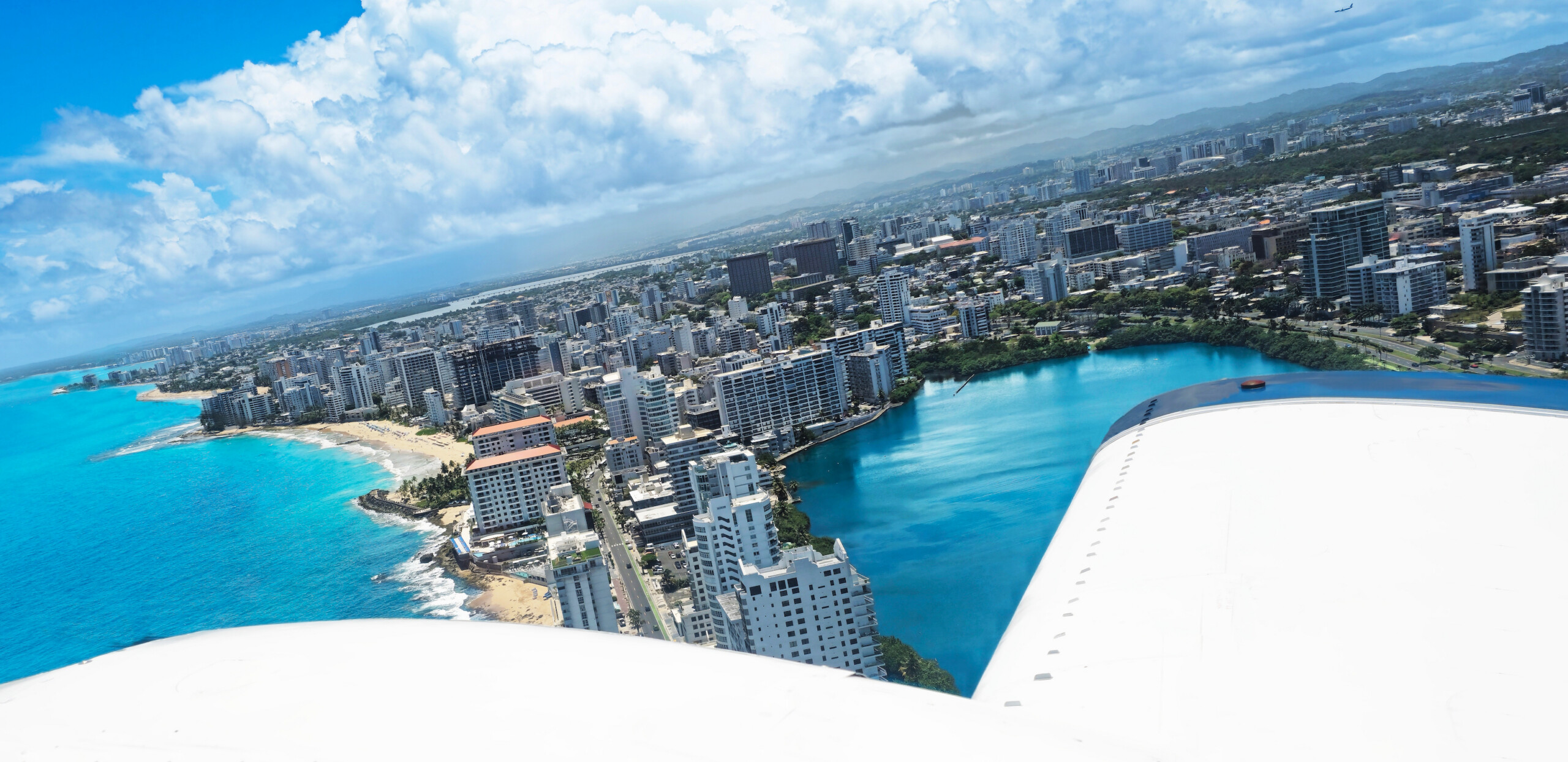 Condado San Juan seen from an Island Birds aircraft after departing Isla Grande Airport SIG